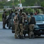 Army troops stand guard in the Red Zone in Islamabad on May 11, 2023.