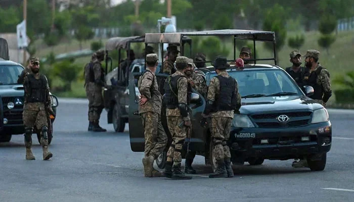 Army troops stand guard in the Red Zone in Islamabad on May 11, 2023.
