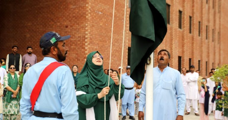 flag hoisted women university